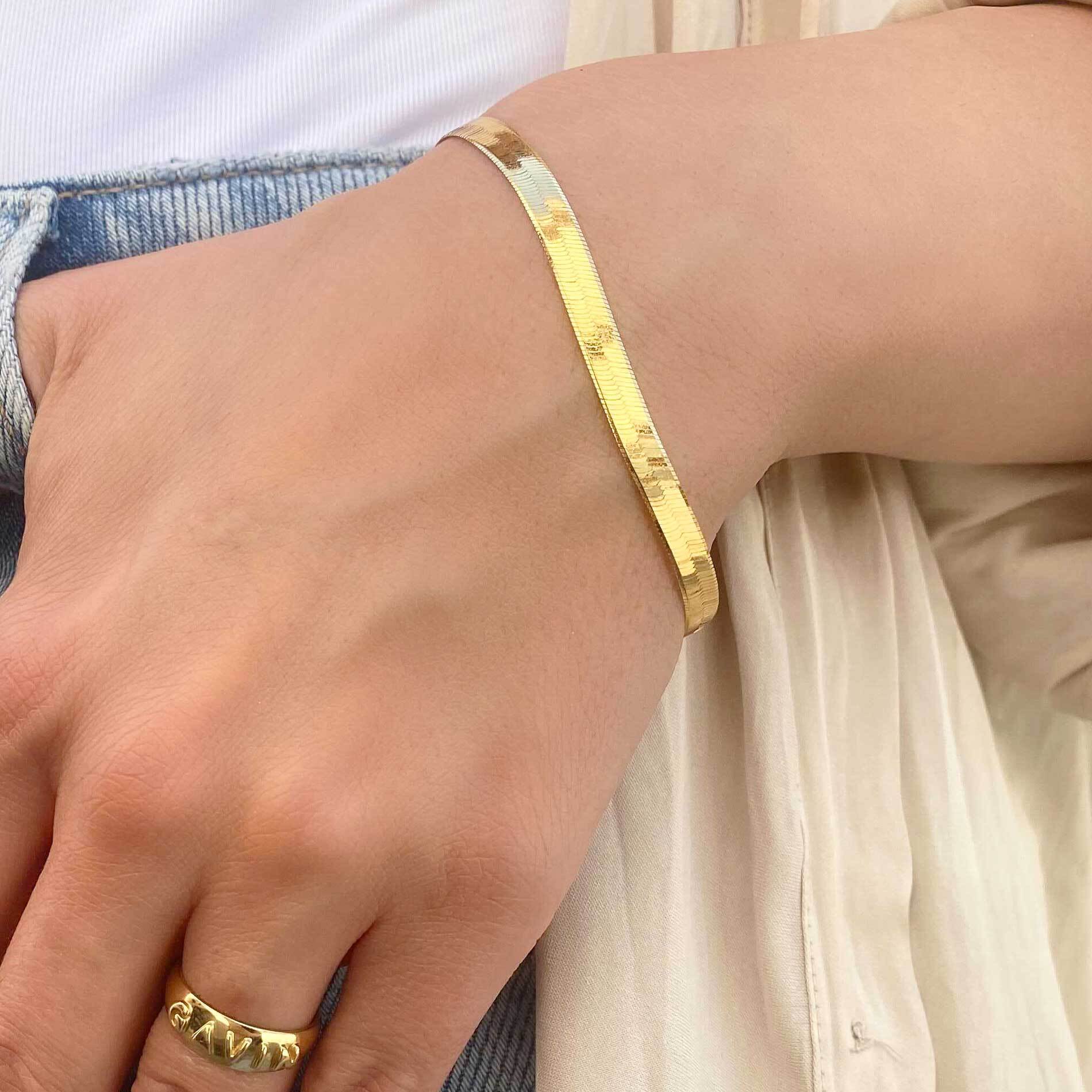 A relevant stock photo of 14k gold armband in a typical setting.
