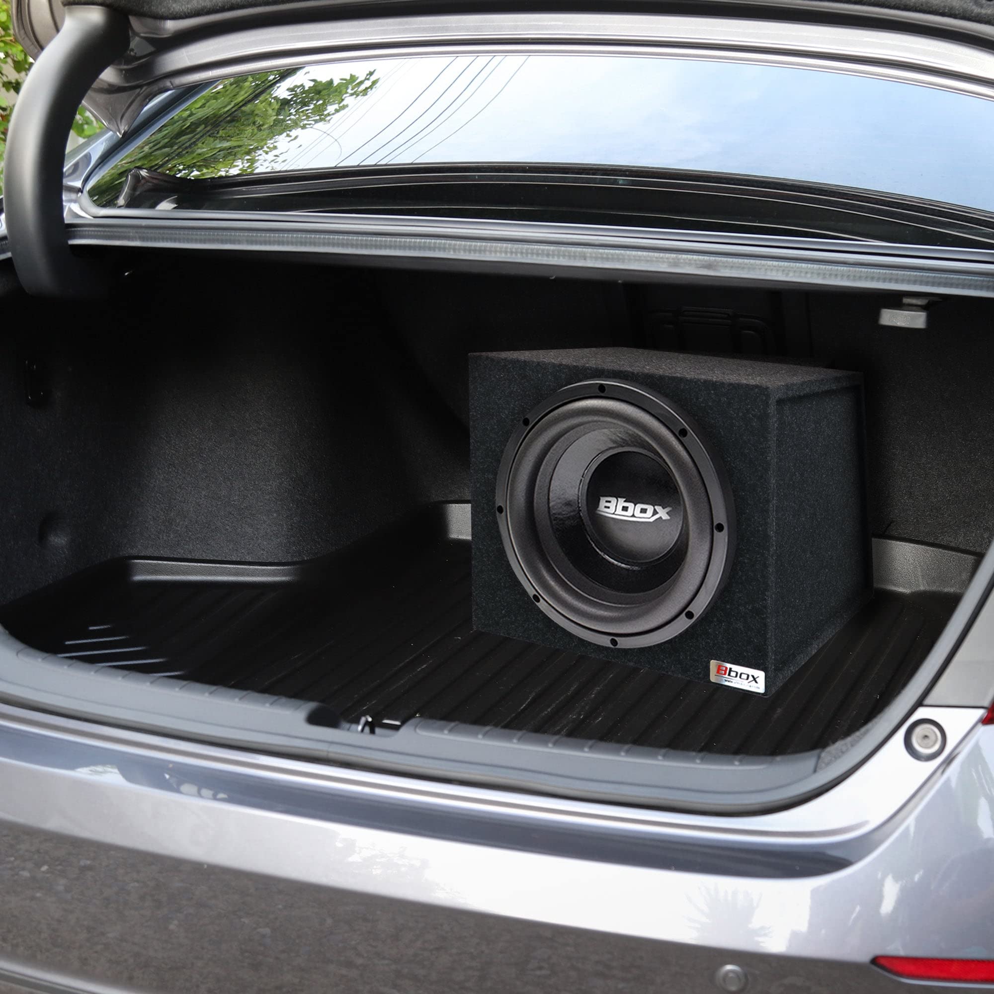 A relevant stock photo of 15 inch subwoofer in a typical setting.