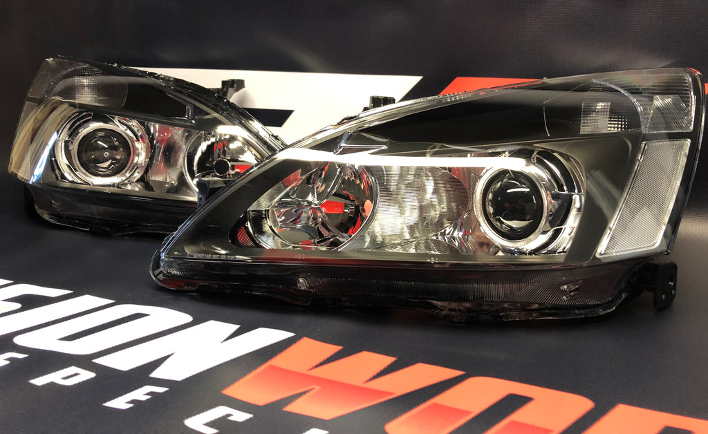 A relevant stock photo of 2005 honda accord bi-led headlights in a typical setting.