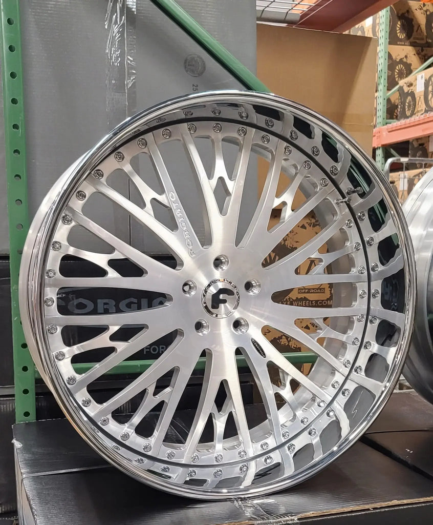 A relevant stock photo of 24 inch rims in a typical setting.