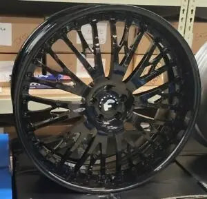 A relevant stock photo of 24 inch rims in a typical setting.