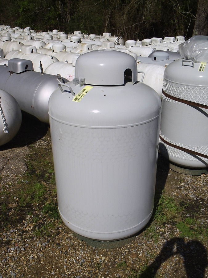 A relevant stock photo of 250 gallon propane tank in a typical setting.