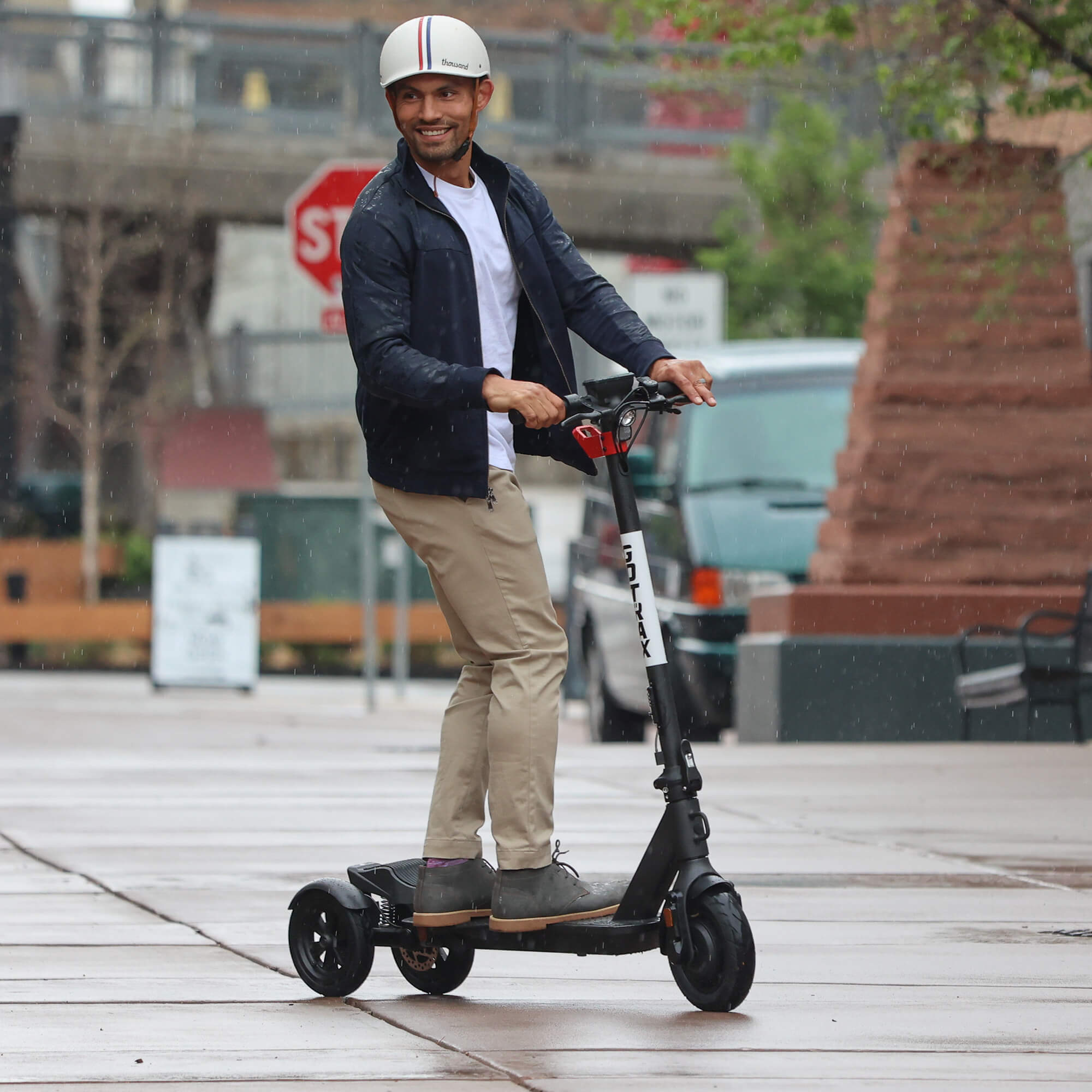 A relevant stock photo of 3 wheel electric scooter in a typical setting.