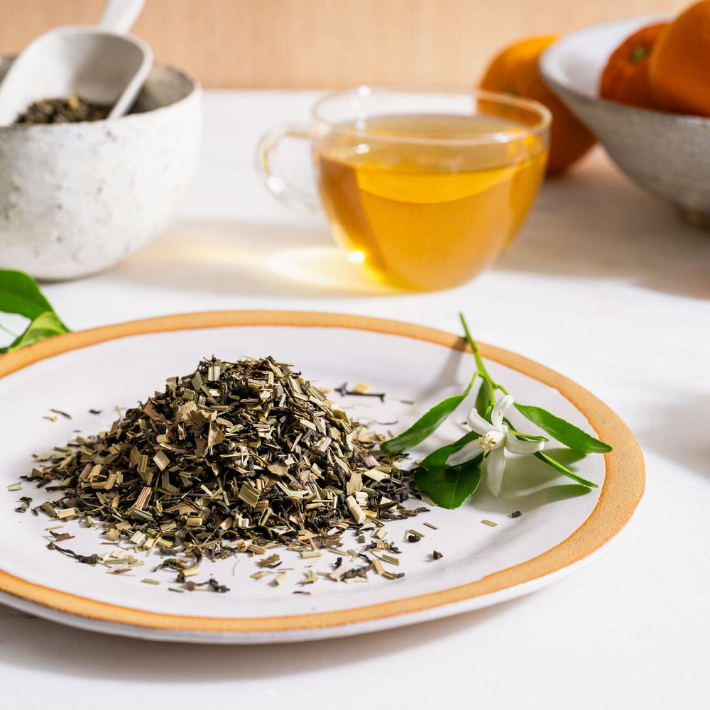 A relevant stock photo of asian loose leaf orange blossom tea in a typical setting.