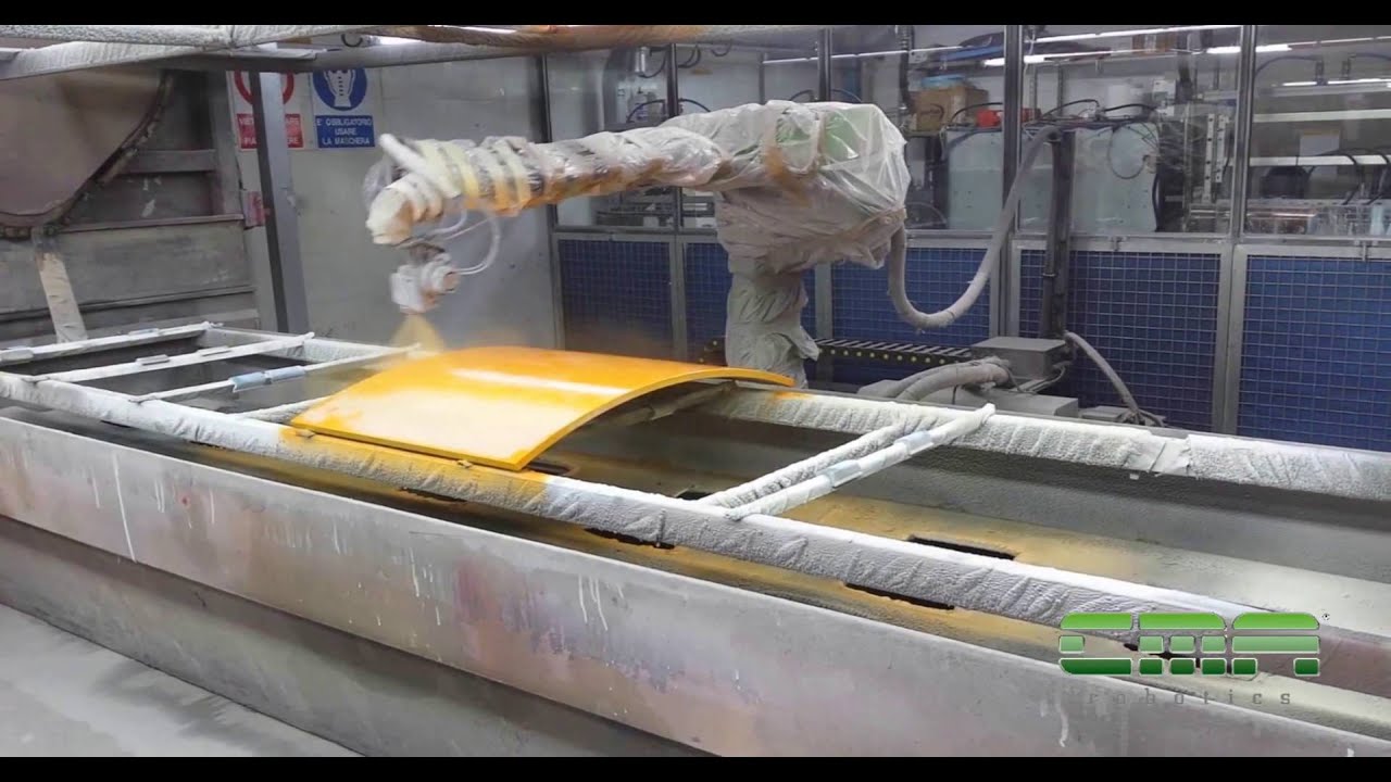 A relevant stock photo of automatic spray painting in a typical setting.