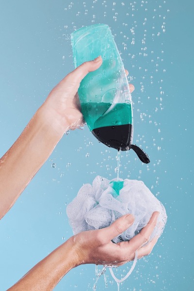A relevant stock photo of bath sponge in a typical setting.