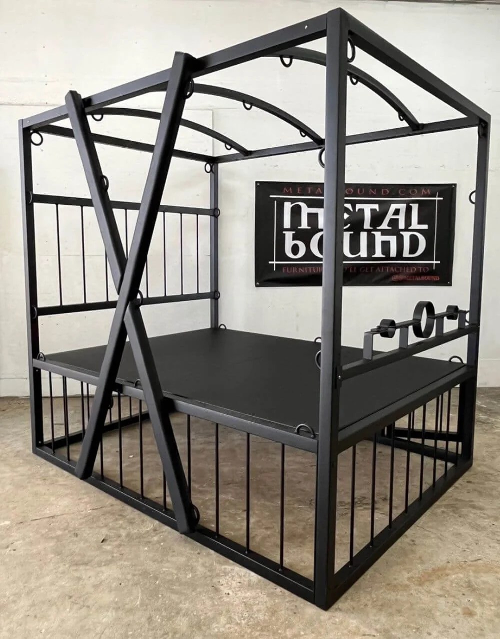 A relevant stock photo of bdsm bed in a typical setting.