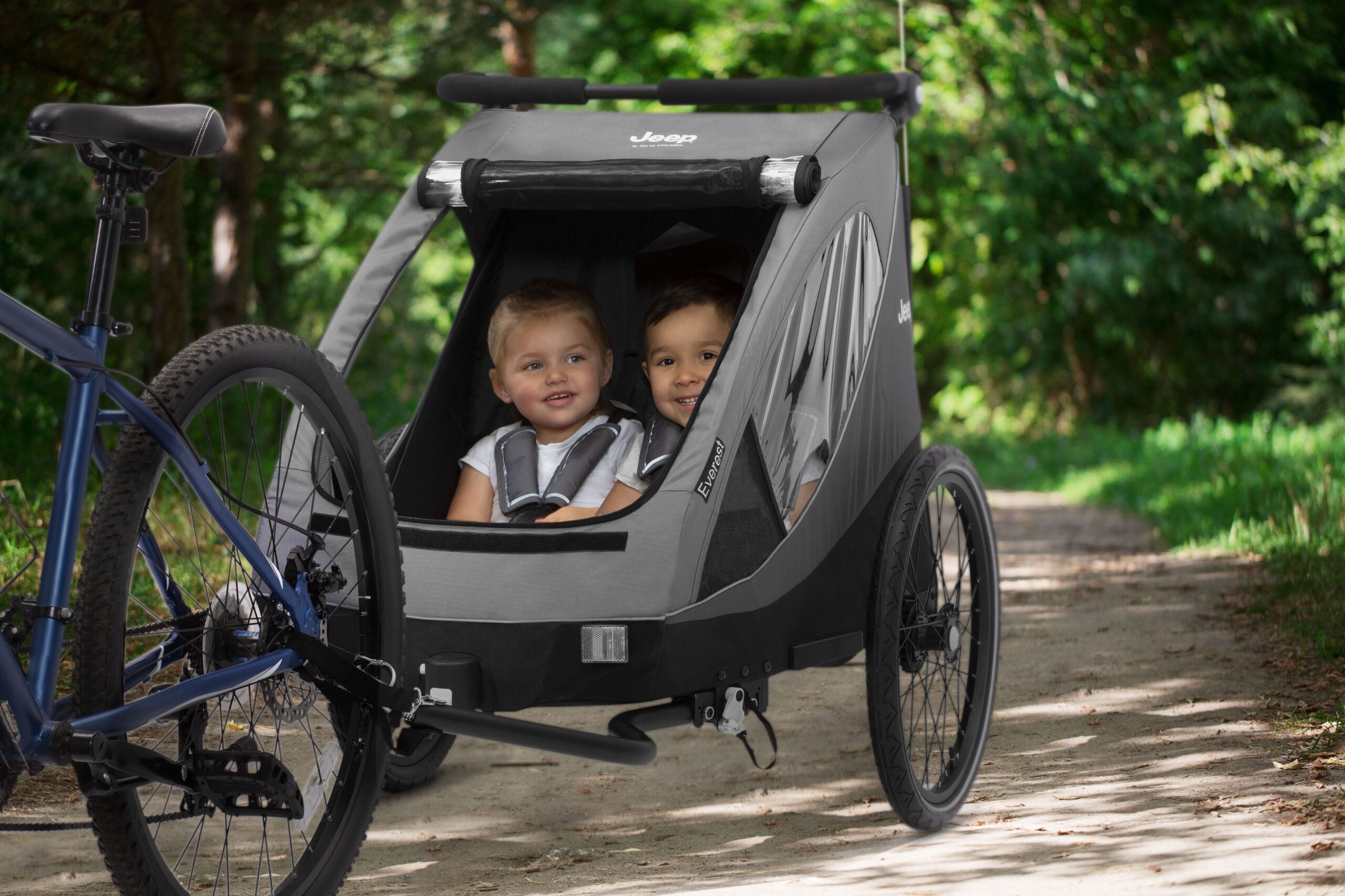 A relevant stock photo of bicycle and stroller in a typical setting.