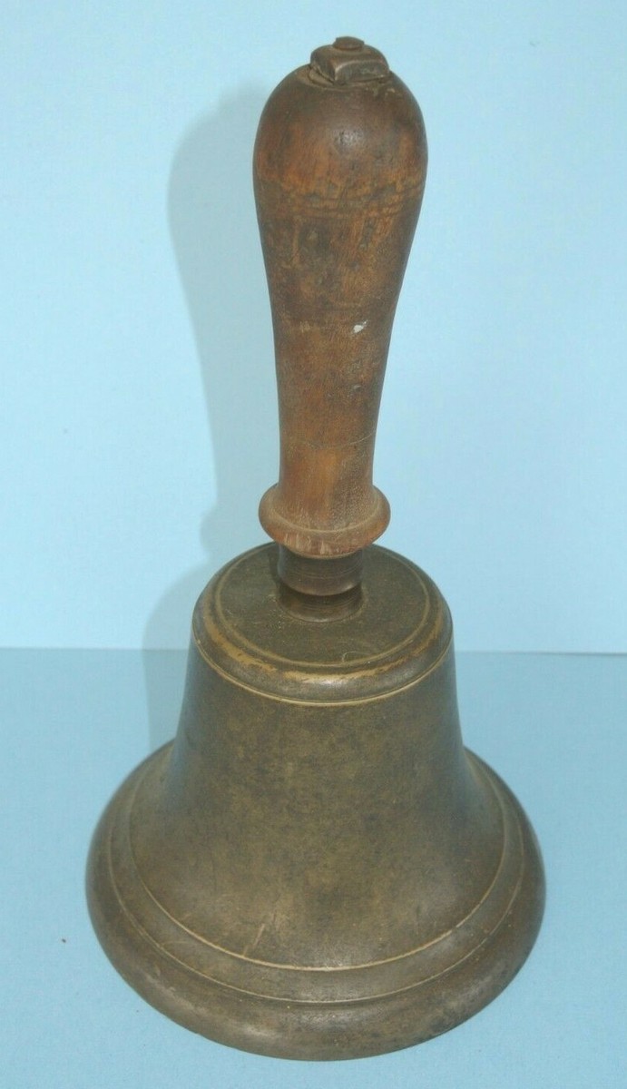 A relevant stock photo of buy vintage brass bell in a typical setting.