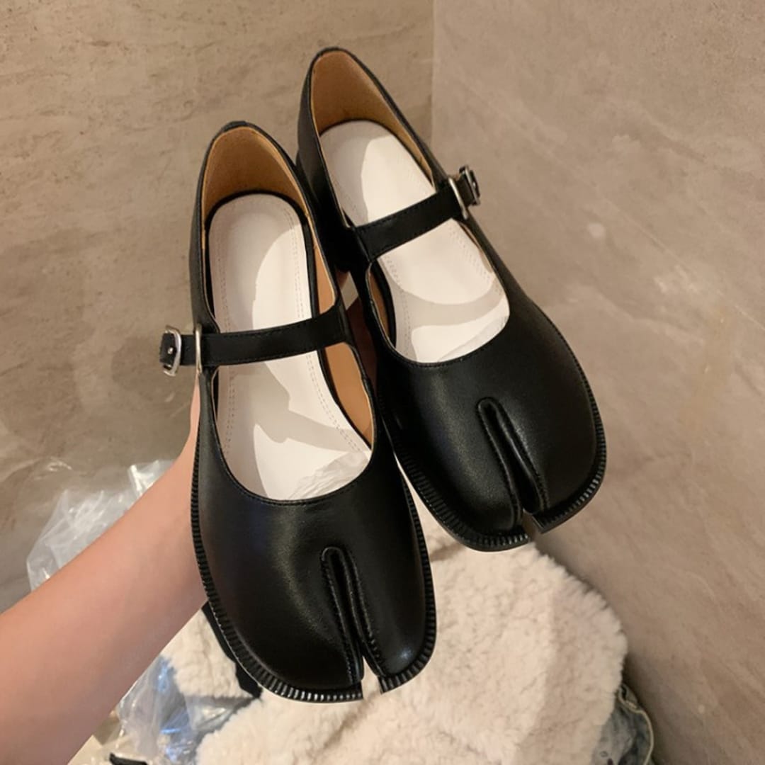 A relevant stock photo of camel toe shoes in a typical setting.