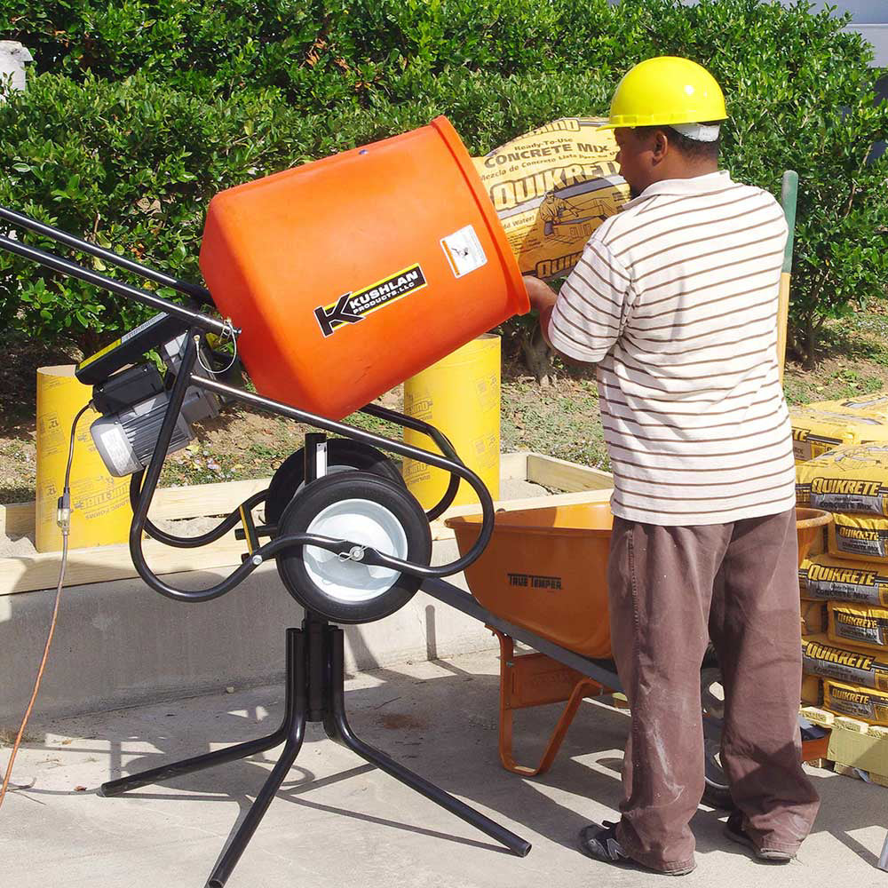 A relevant stock photo of cement mixer mixer in a typical setting.