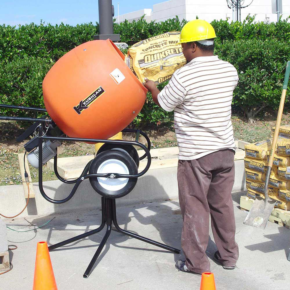 A relevant stock photo of cement mixer mixer in a typical setting.