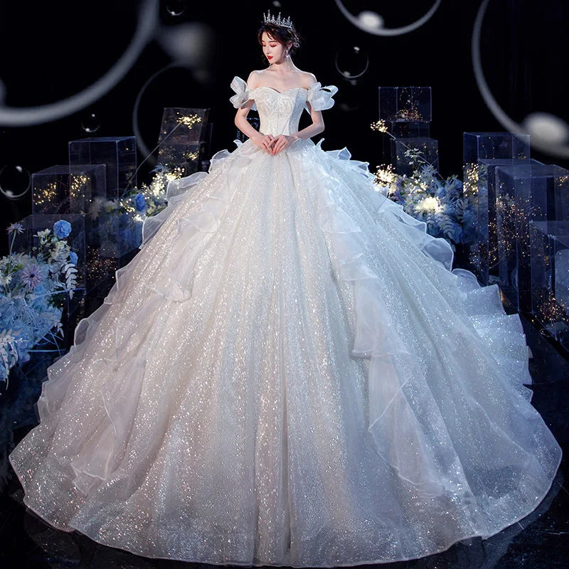 A relevant stock photo of cinderella wedding dress in a typical setting.