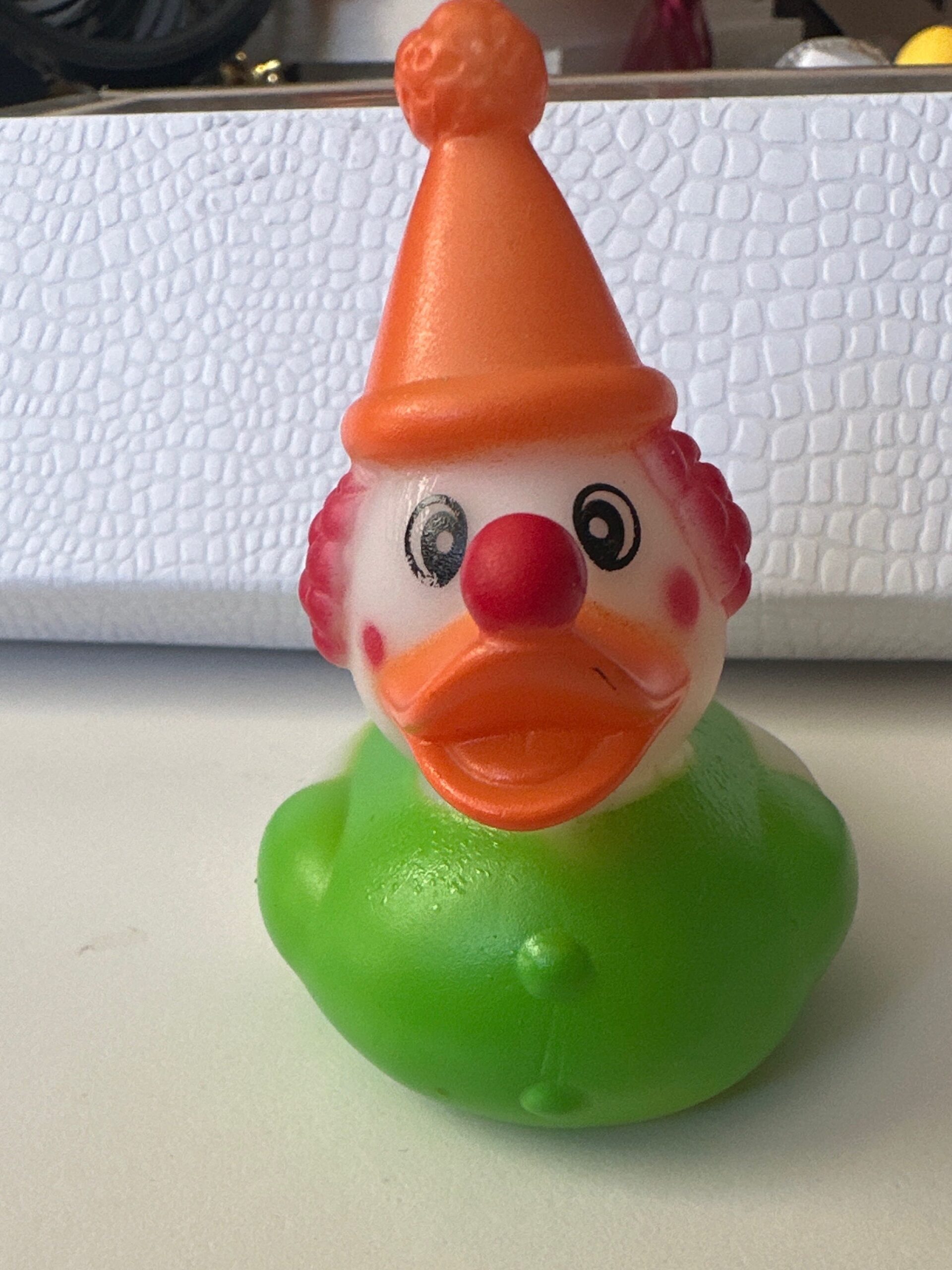 A relevant stock photo of clown rubber duck vibrator in a typical setting.