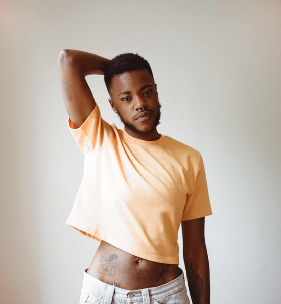 A relevant stock photo of crop tops for man in a typical setting.