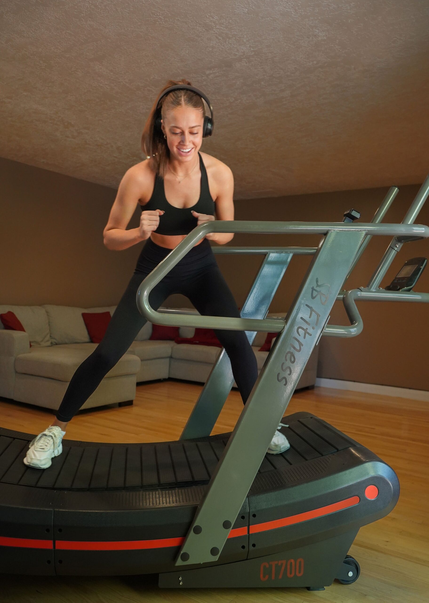 A relevant stock photo of curved treadmill in a typical setting.