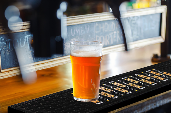 A relevant stock photo of custom drink mats in a typical setting.