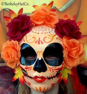 A relevant stock photo of dia los muertos masks in a typical setting.