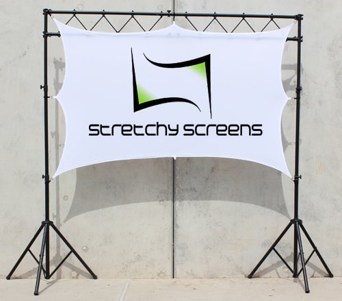 A relevant stock photo of dj projection screen on truss in a typical setting.