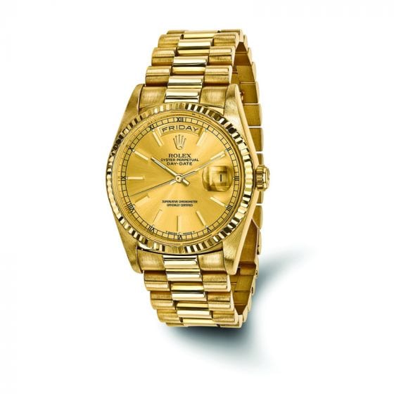 A relevant stock photo of gents gold rolex watches in a typical setting.