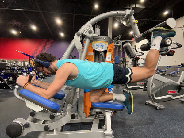 A relevant stock photo of glute kickback machine in a typical setting.