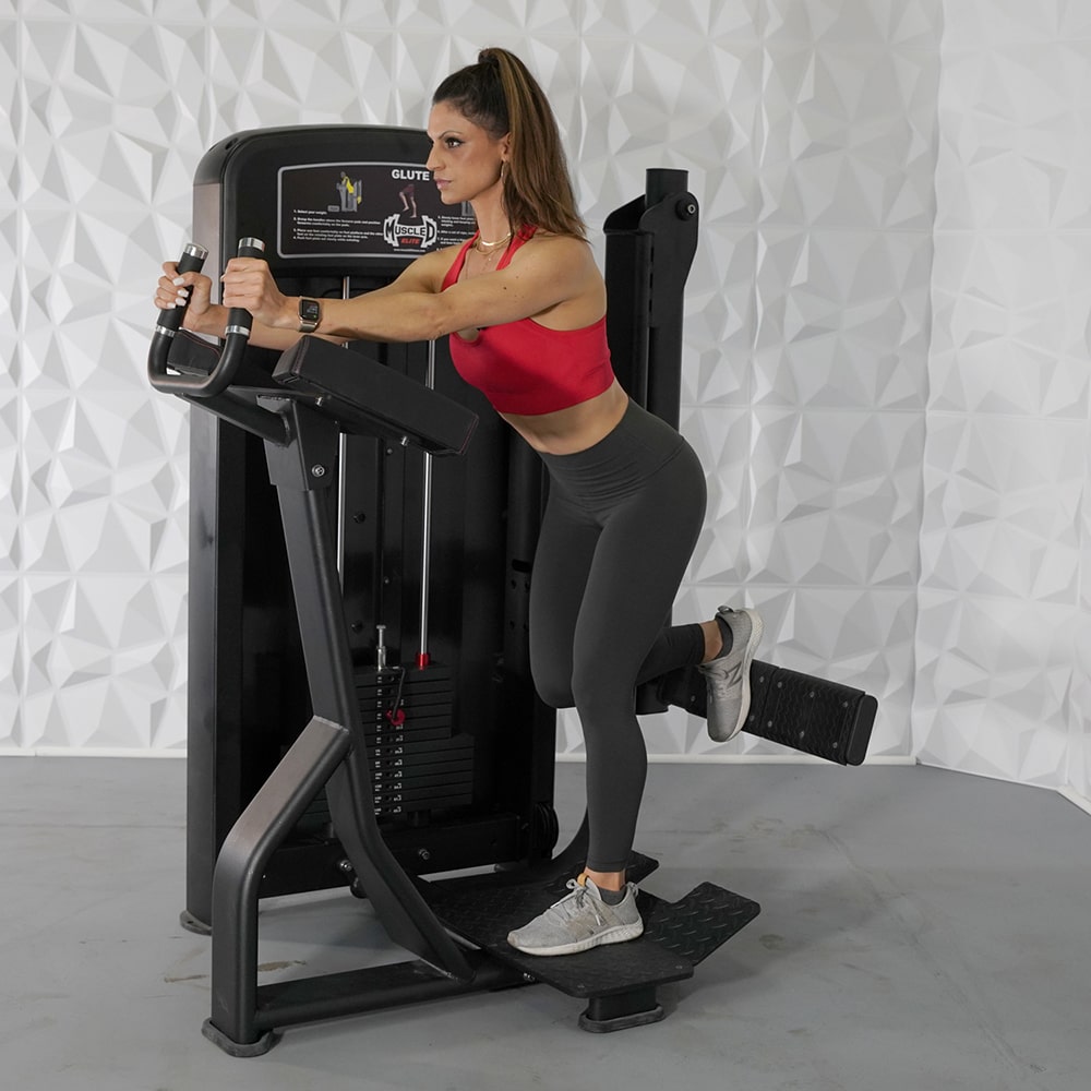 A relevant stock photo of glute kickback machine in a typical setting.