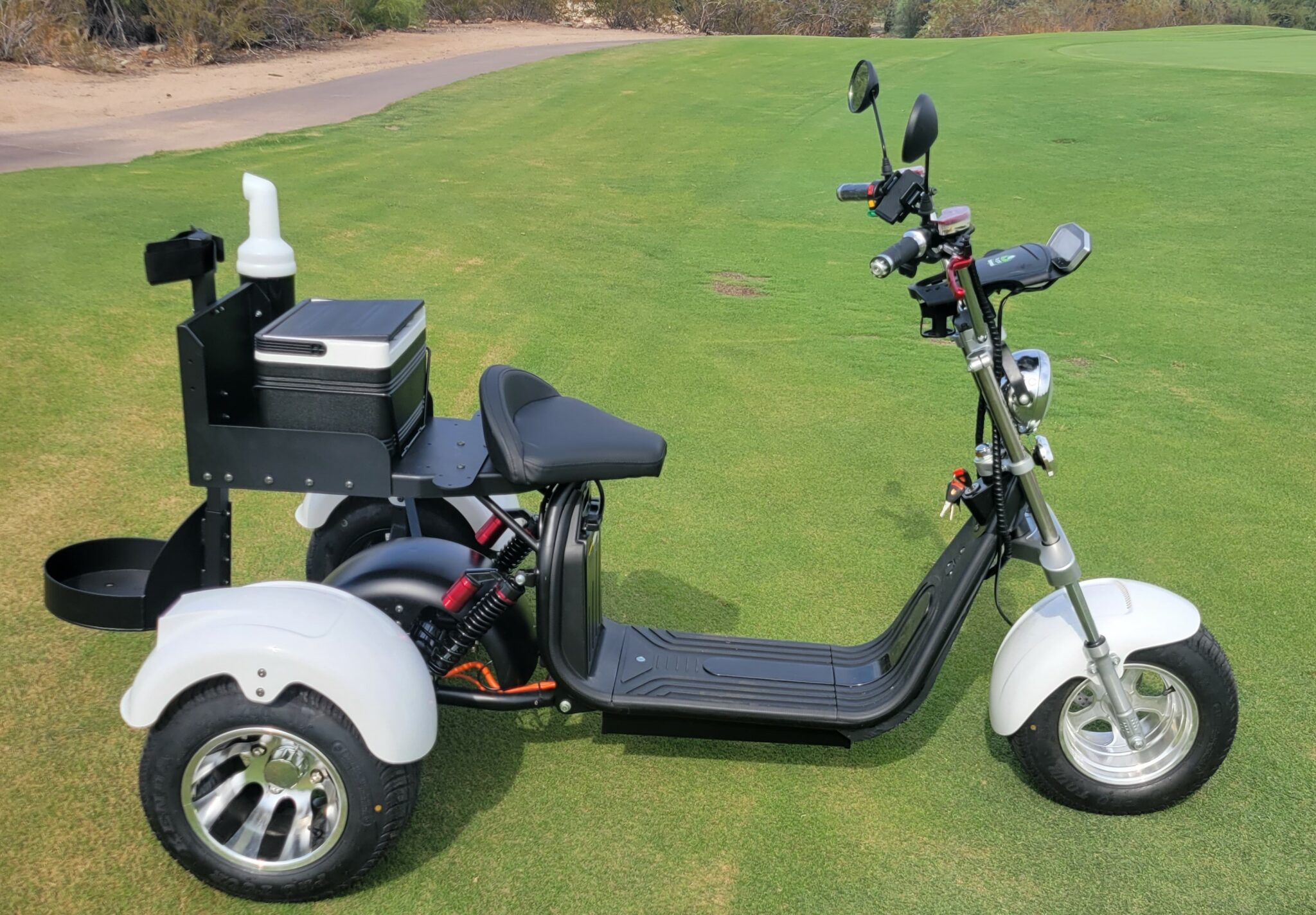 A relevant stock photo of golf scooter in a typical setting.