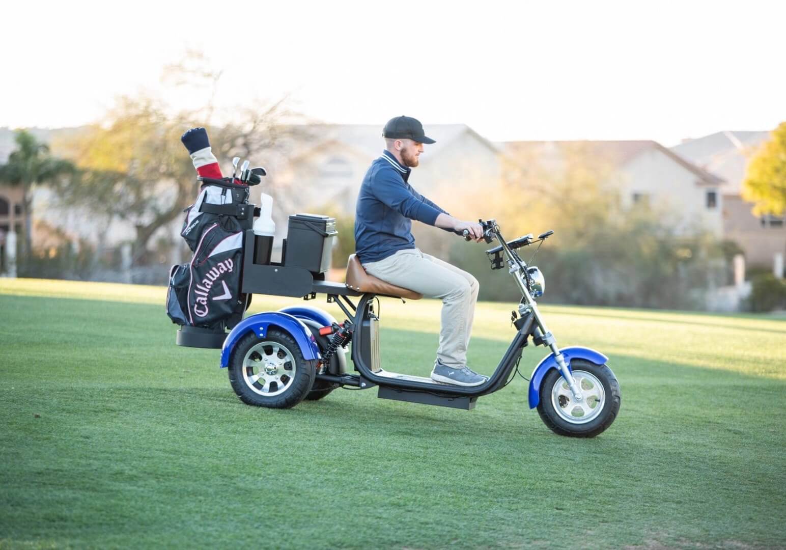 A relevant stock photo of golf scooter in a typical setting.