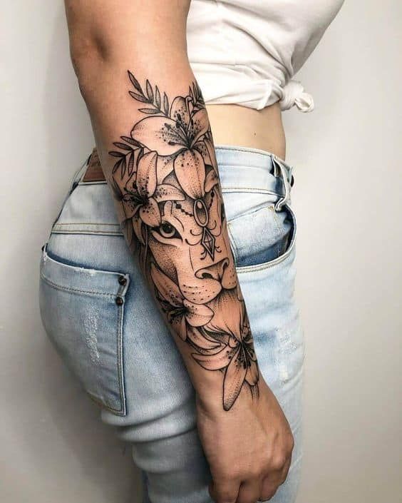 A relevant stock photo of half sleeve tattoo lower arm in a typical setting.