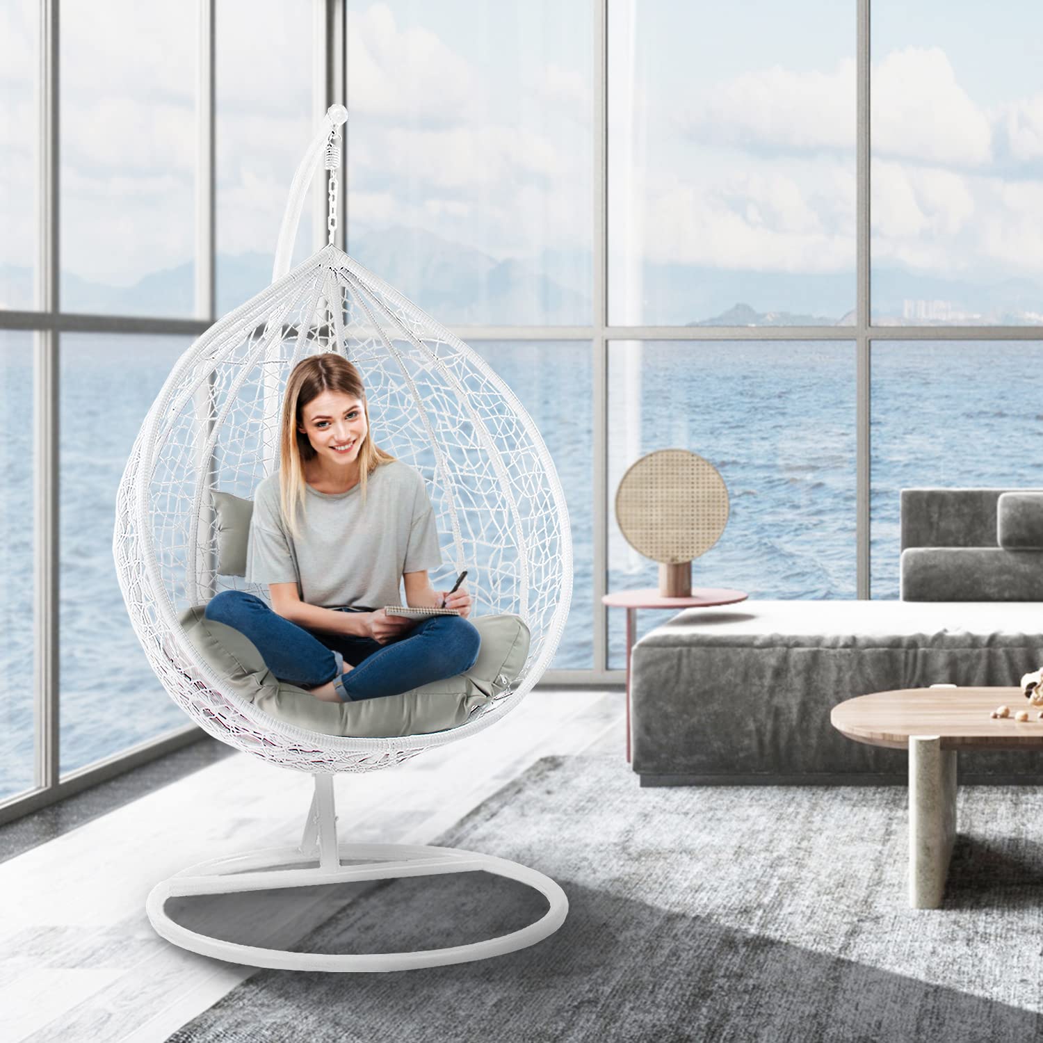 A relevant stock photo of hanging chairs chair in a typical setting.