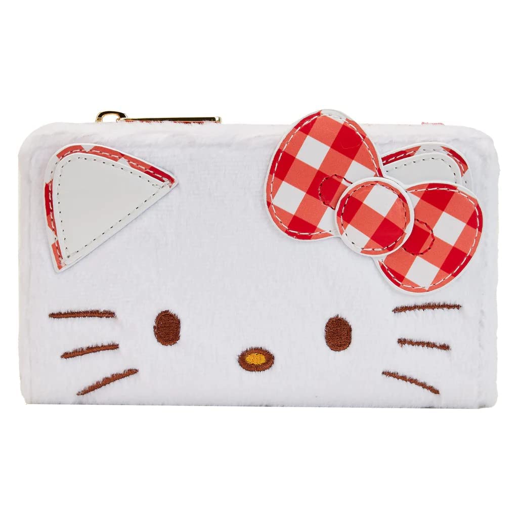 A relevant stock photo of hello kitty wallet in a typical setting.