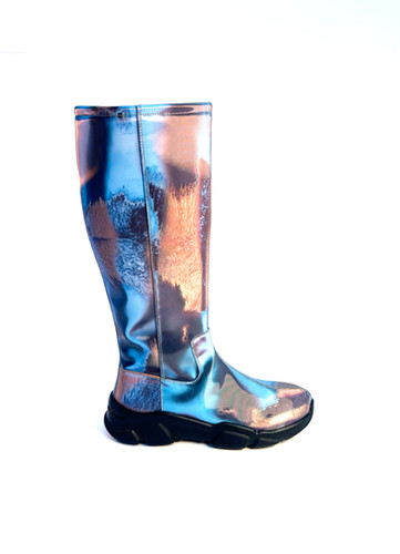 A relevant stock photo of holographic knee high space boots in a typical setting.