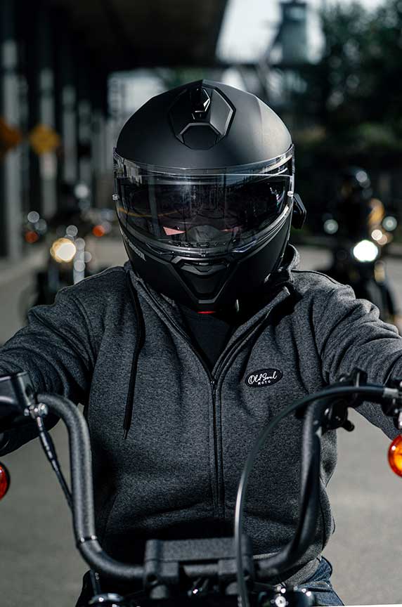 A relevant stock photo of hoodie motorbike in a typical setting.