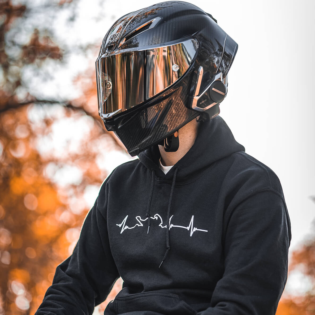 A relevant stock photo of hoodie motorbike in a typical setting.