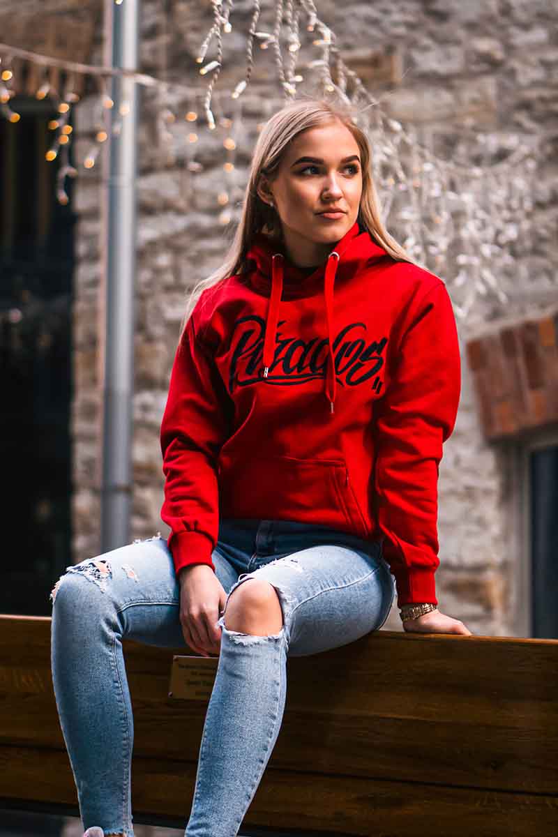A relevant stock photo of hoodie red black in a typical setting.