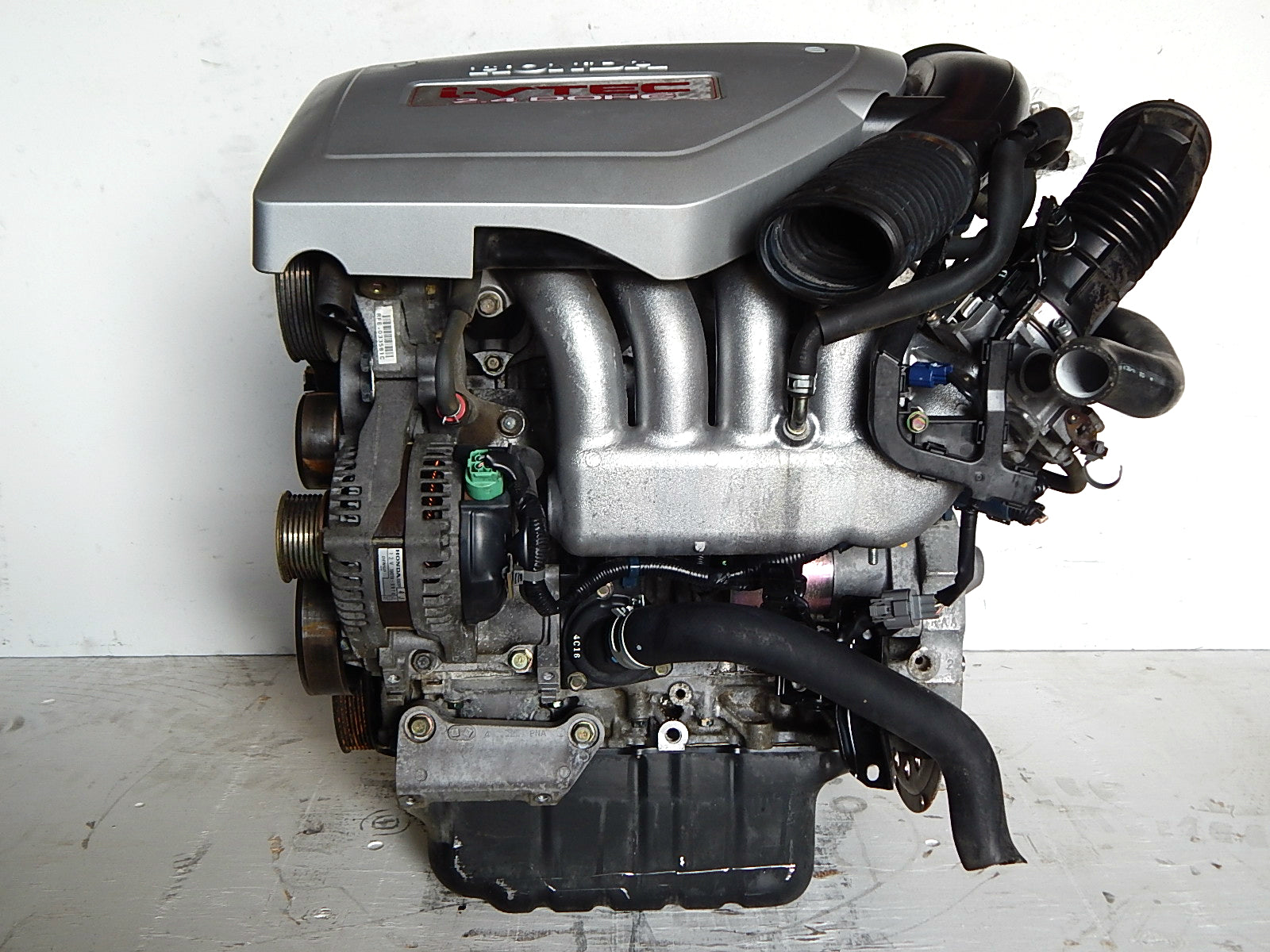 A relevant stock photo of k24 engine for sale in a typical setting.