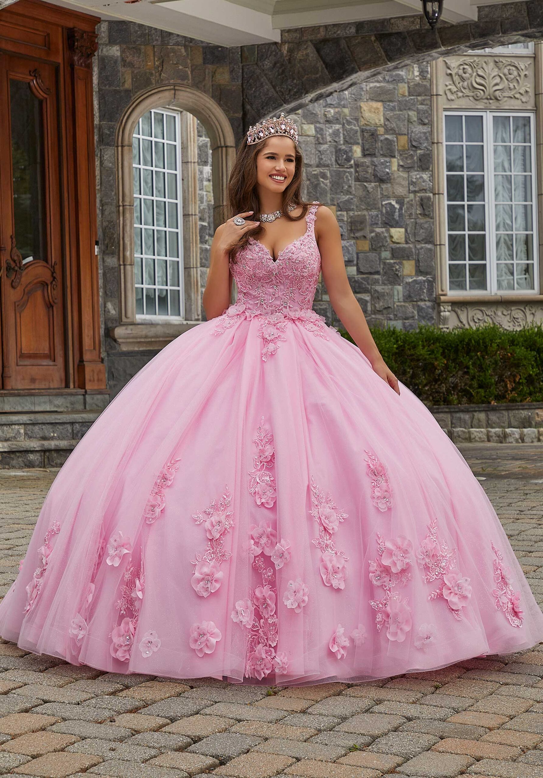 A relevant stock photo of pink fifteen dresses in a typical setting.