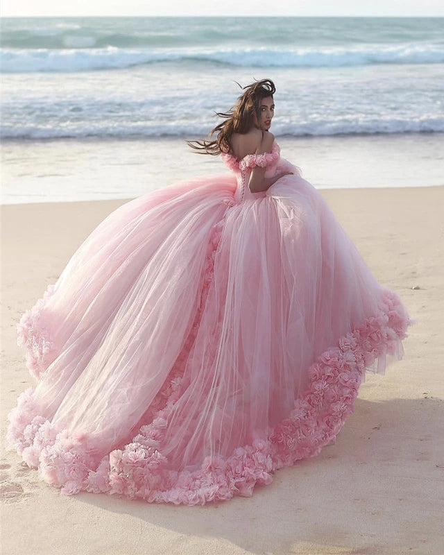 A relevant stock photo of pink fifteen dresses in a typical setting.