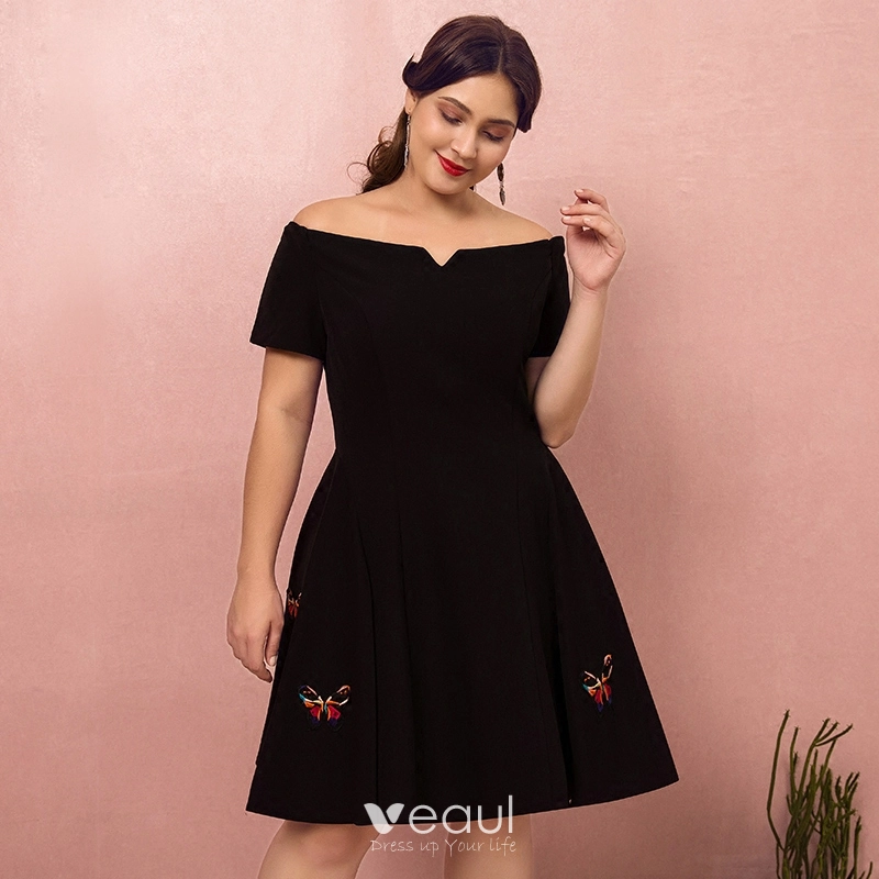 A relevant stock photo of plus size graduation dresses in a typical setting.