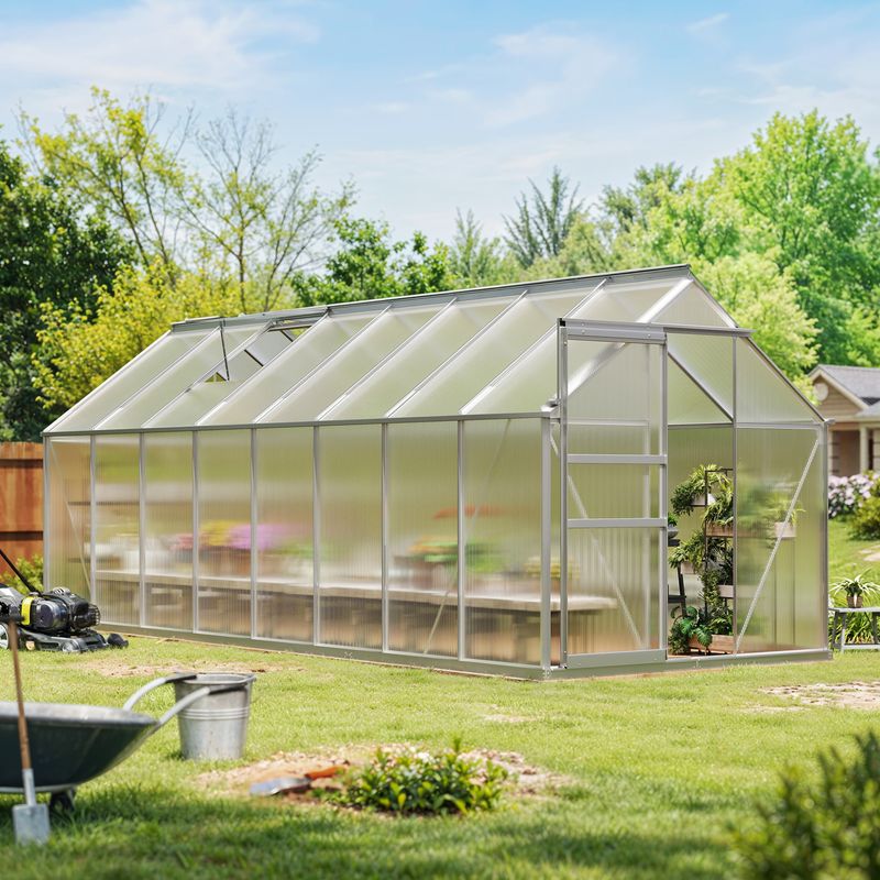 A relevant stock photo of polycarbonate greenhouse in a typical setting.