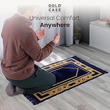 A relevant stock photo of prayer mat praying in a typical setting.