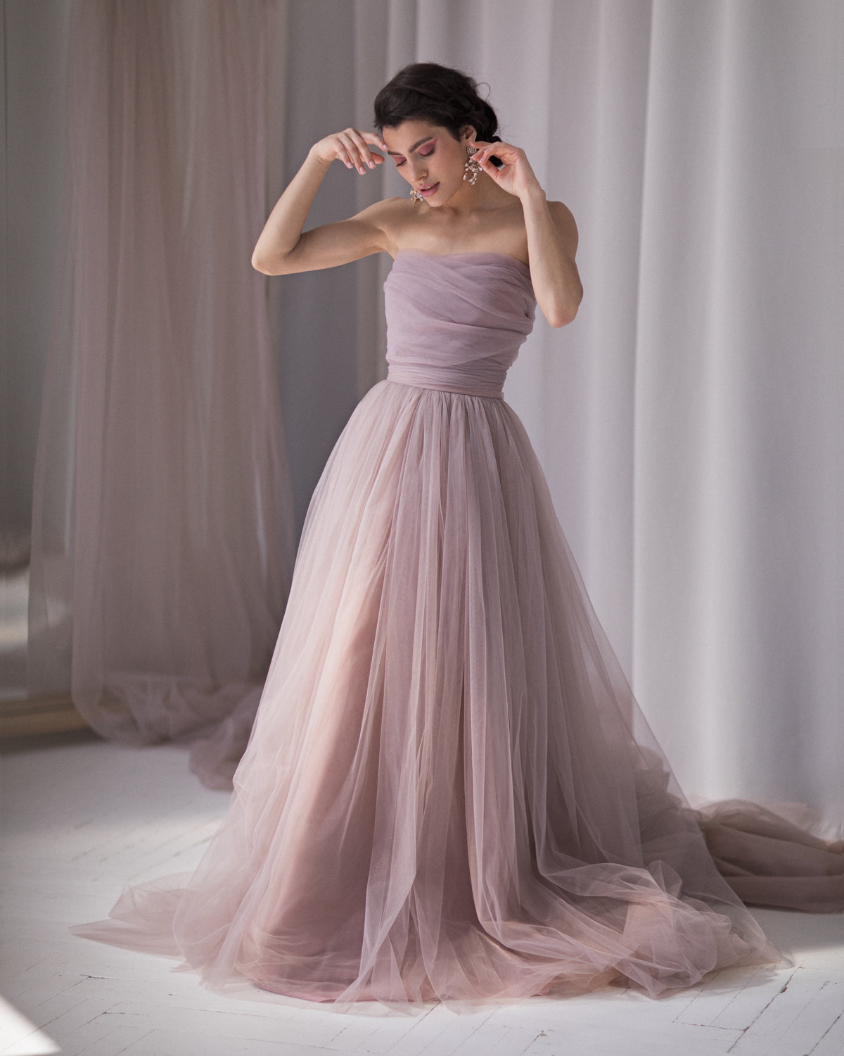 A relevant stock photo of purple wedding dress in a typical setting.