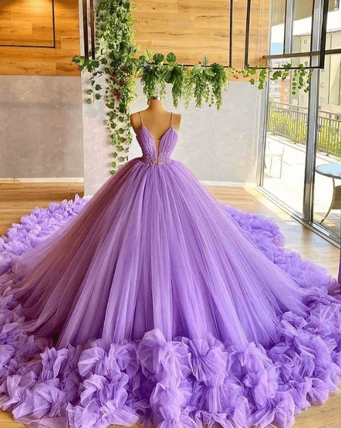 A relevant stock photo of purple wedding dress in a typical setting.