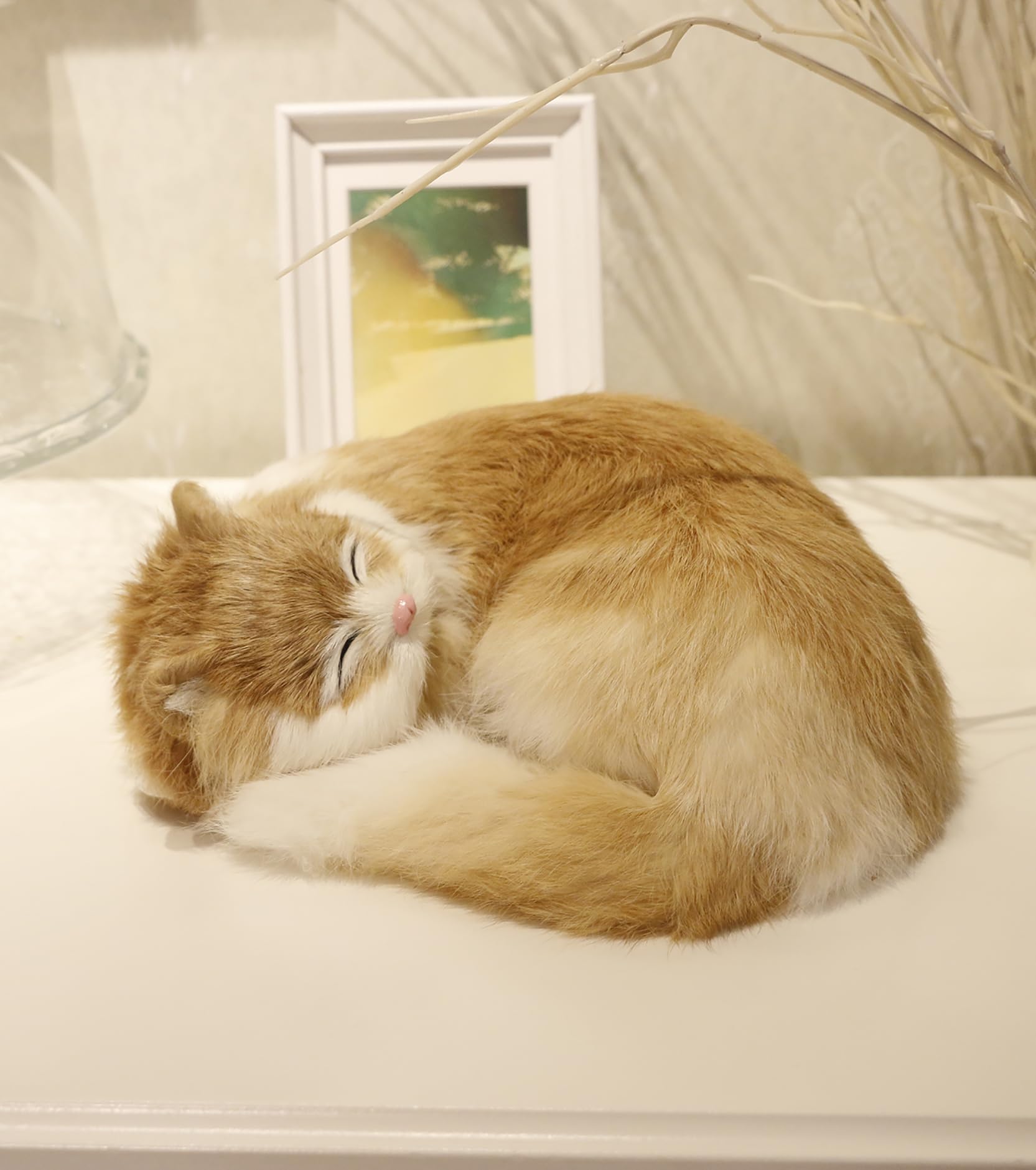 A relevant stock photo of realistic looking cat prop in a typical setting.