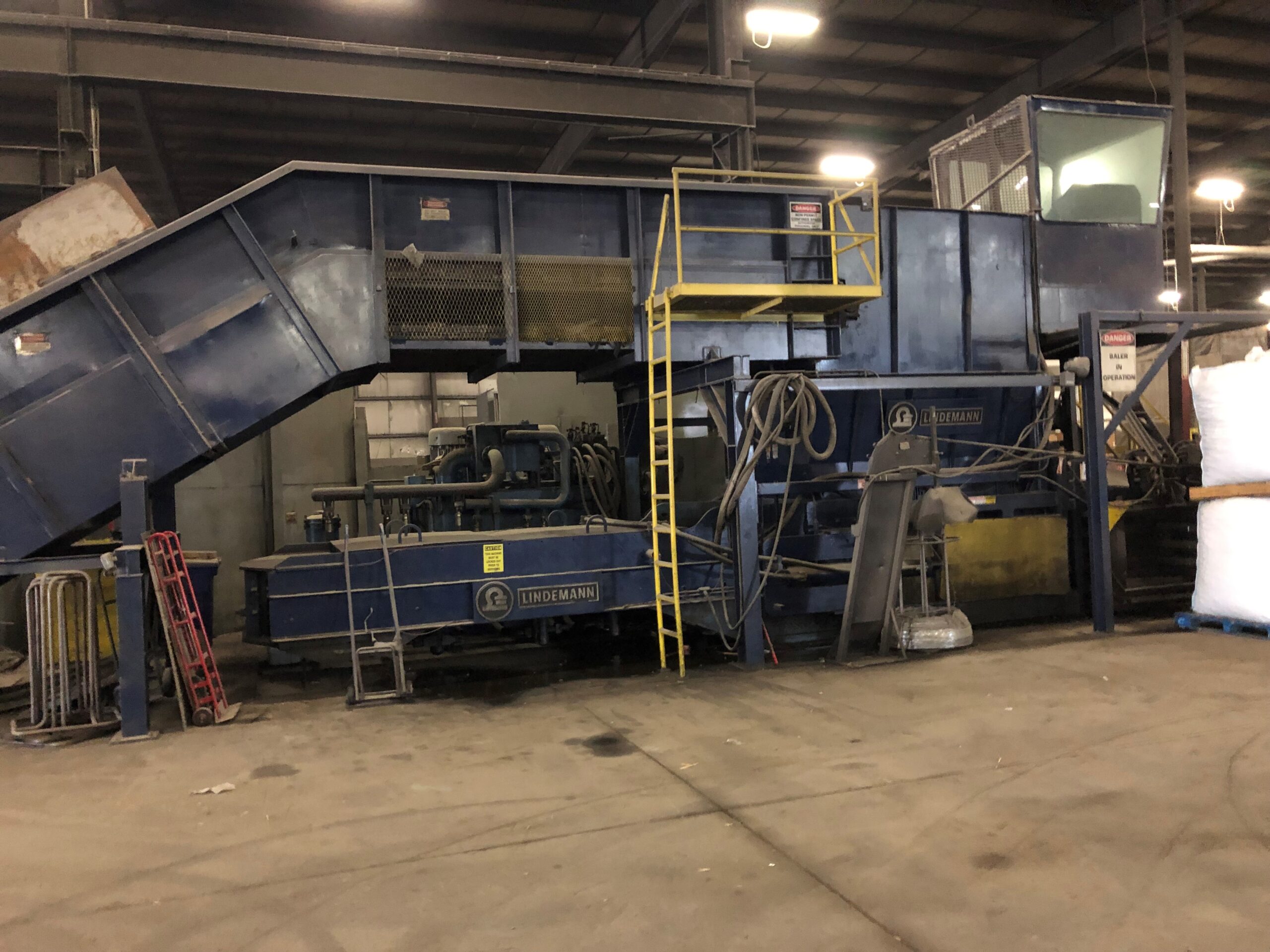A relevant stock photo of recycling equipment for sale in a typical setting.