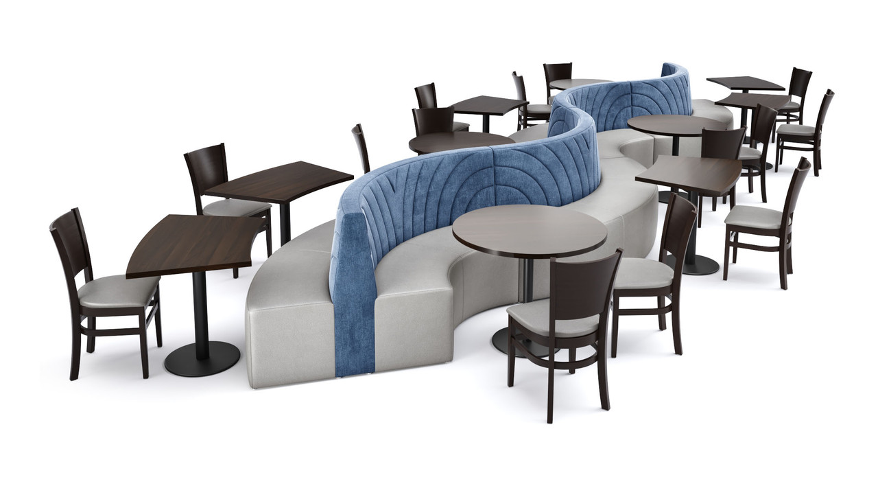 A relevant stock photo of restaurant chairs in a typical setting.