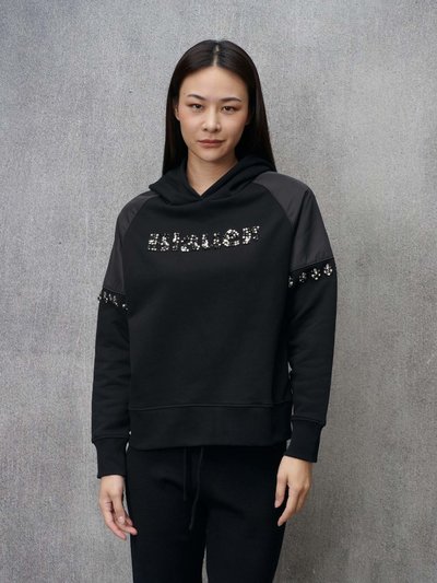 A relevant stock photo of rhinestone hoodie in a typical setting.