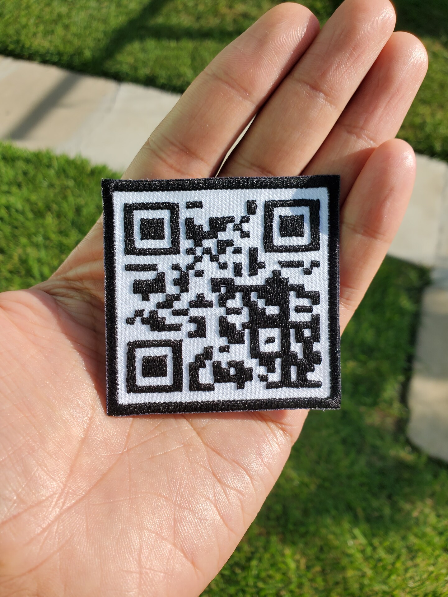 A relevant stock photo of rick roll qr code patch in a typical setting.