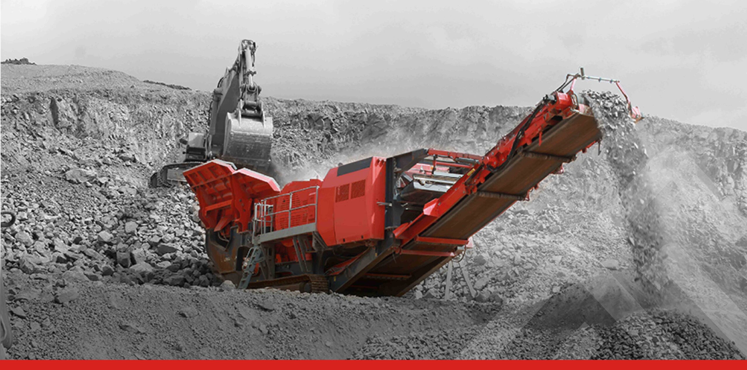 A relevant stock photo of rock crusher in a typical setting.