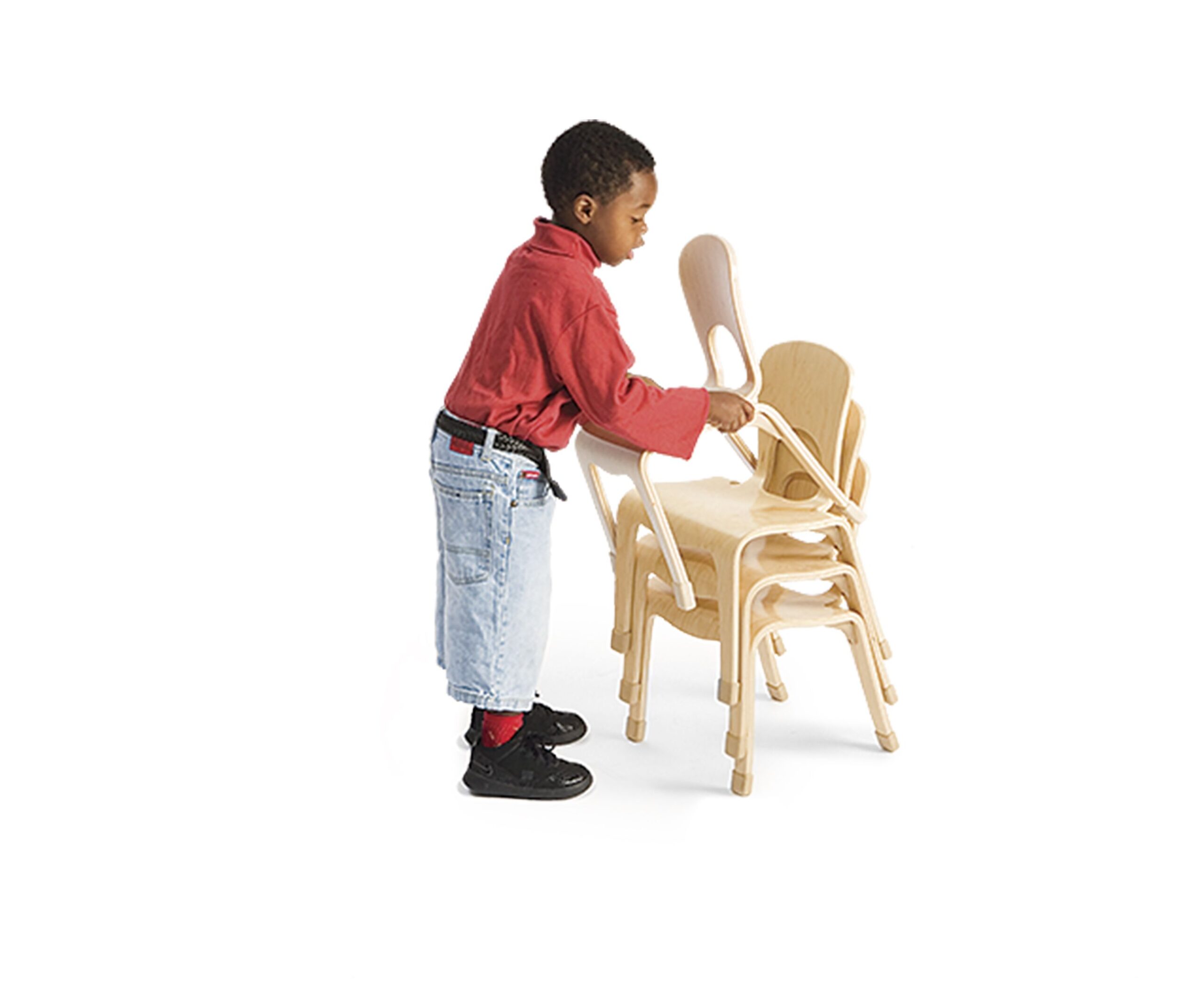 A relevant stock photo of school chairs in a typical setting.